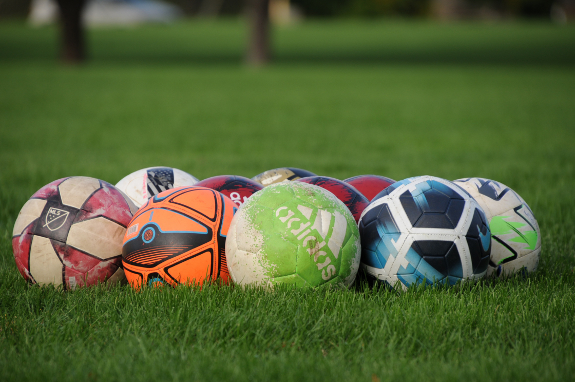 pile of soccer balls